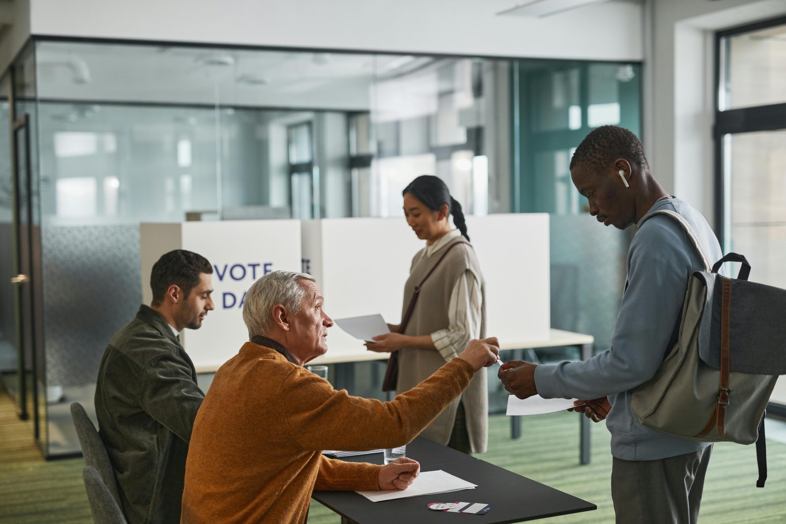 stock image of people voting.